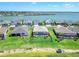 Real estate featuring waterfront homes, lush landscaping, and stunning community views at 16064 Shoreline Dr, Punta Gorda, FL 33982