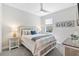 Comfortable bedroom with carpet, a window, and a wooden bed frame at 16064 Shoreline Dr, Punta Gorda, FL 33982