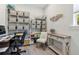 Well-organized office space with shelving and a dedicated workspace at 16064 Shoreline Dr, Punta Gorda, FL 33982