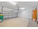 Spacious garage with an automatic door opener and ample storage space at 16308 Sunset Palms Blvd # 1702, Punta Gorda, FL 33955