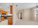 Spacious eat-in kitchen featuring stainless steel appliances, granite countertops, and tiled floors at 16308 Sunset Palms Blvd # 1702, Punta Gorda, FL 33955