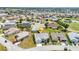 Beautiful aerial view of home with lush lawn, mature landscaping, and convenient driveway at 1848 Birmingham Blvd, Port Charlotte, FL 33980
