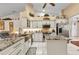 Bright kitchen with updated cabinets, stainless steel appliances, and a large island at 1848 Birmingham Blvd, Port Charlotte, FL 33980