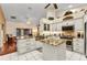Kitchen featuring granite countertops, stainless steel appliances, tile backsplash, and center island at 1848 Birmingham Blvd, Port Charlotte, FL 33980