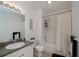 Well-lit bathroom featuring a shower-tub combination, vanity with sink and a toilet at 2060 Willow Hammock Cir # 207, Punta Gorda, FL 33983