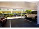 Designated covered parking area for residents within the condominium complex at 2060 Willow Hammock Cir # 207, Punta Gorda, FL 33983
