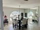 A mirrored wall enhances the space of this elegant dining room at 2095 Ellery St, Port Charlotte, FL 33952
