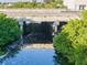 Scenic aerial view showcasing waterway surrounded by lush green trees at 2095 Ellery St, Port Charlotte, FL 33952