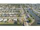 Sprawling neighborhood with canals and tree-lined streets, creating a serene waterfront community at 2201 Birchcrest Blvd, Port Charlotte, FL 33952