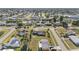 Residential neighborhood featuring diverse homes along a tranquil canal, offering waterfront living at 2201 Birchcrest Blvd, Port Charlotte, FL 33952