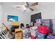 Bedroom filled with stored boxes, offering a glimpse of potential storage space for organization at 2201 Birchcrest Blvd, Port Charlotte, FL 33952