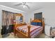 Comfortable bedroom with wooden furniture, providing a cozy space for rest and relaxation at 2201 Birchcrest Blvd, Port Charlotte, FL 33952