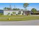 Charming single-story home with well-maintained landscaping at 2201 Birchcrest Blvd, Port Charlotte, FL 33952