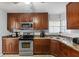 Functional kitchen featuring updated appliances, and ample counter space, providing an ideal cooking experience at 2201 Birchcrest Blvd, Port Charlotte, FL 33952