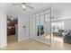 Open-concept design: Living room with unique partition flowing into kitchen, creating a seamless and inviting space at 2201 Birchcrest Blvd, Port Charlotte, FL 33952