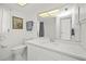 All-white bathroom featuring modern sink and neutral decor at 2333 Rio De Janeiro Ave, Punta Gorda, FL 33983