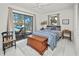 Bright bedroom with sliding glass doors and access to outdoor patio at 2333 Rio De Janeiro Ave, Punta Gorda, FL 33983