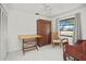 This room features a ceiling fan, light walls, and a window that lets in lots of natural light at 2333 Rio De Janeiro Ave, Punta Gorda, FL 33983