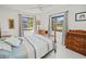 Bright bedroom featuring modern decor, ceiling fan and traditional furnishings at 2333 Rio De Janeiro Ave, Punta Gorda, FL 33983