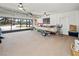 This garage features a boat on a trailer, plenty of storage space, and lots of natural light at 2333 Rio De Janeiro Ave, Punta Gorda, FL 33983