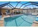 A lovely screened in pool and patio area for outdoor enjoyment at 2333 Rio De Janeiro Ave, Punta Gorda, FL 33983