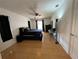 Spacious bedroom with tile flooring, ceiling fan, and a window for natural light at 234 Shadow Nw St, Port Charlotte, FL 33952