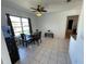 Dining area with large windows bringing in natural light at 234 Shadow Nw St, Port Charlotte, FL 33952