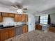 Well-lit kitchen boasts stone countertops and plenty of cabinet storage at 234 Shadow Nw St, Port Charlotte, FL 33952
