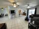 Bright living room with seamless access to both the kitchen and outdoor spaces at 234 Shadow Nw St, Port Charlotte, FL 33952