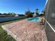 Backyard pool and brick patio at 234 Shadow Nw St, Port Charlotte, FL 33952