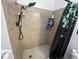 Shower includes handheld and rainfall shower heads with tiled surround at 234 Shadow Nw St, Port Charlotte, FL 33952