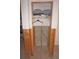 Small closet with wood supports, overhead shelf, and clothing storage at 285 Bal Harbor Blvd, Punta Gorda, FL 33950