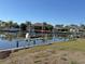 View of a canal with a private dock and boat lift, offering waterfront access at 285 Bal Harbor Blvd, Punta Gorda, FL 33950