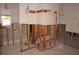 Unfinished kitchen with exposed framing, ready for remodel at 285 Bal Harbor Blvd, Punta Gorda, FL 33950