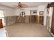 Spacious living room featuring tile floors, decorative items, and natural lighting at 285 Bal Harbor Blvd, Punta Gorda, FL 33950