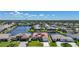 Wonderful waterfront homes boast meticulously manicured lawns, private docks and gorgeous deep water canal access in this aerial at 341 Segovia Dr, Punta Gorda, FL 33950