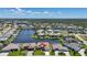 Beautiful waterfront homes line the canals in this stunning aerial view, boasting gorgeous landscaping and serene water access at 341 Segovia Dr, Punta Gorda, FL 33950