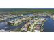 Aerial view showcases an extensive network of navigable waterways with access to the ocean, offering boating enthusiasts prime real estate at 341 Segovia Dr, Punta Gorda, FL 33950