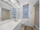 A bathroom with a shower and tub combination and large mirror at 341 Segovia Dr, Punta Gorda, FL 33950