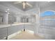 Bright bathroom with double vanity, large mirrors, soaking tub, and shower with glass door at 341 Segovia Dr, Punta Gorda, FL 33950