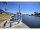 This beautiful property has a private boat lift giving access to waterways and ocean at 341 Segovia Dr, Punta Gorda, FL 33950