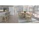 Breakfast nook featuring a table and seating for four, adjacent to kitchen bar at 341 Segovia Dr, Punta Gorda, FL 33950