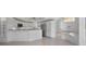 Open kitchen with granite countertops, stainless steel appliances and tiled floors at 341 Segovia Dr, Punta Gorda, FL 33950