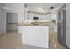 Kitchen with white cabinetry, granite countertops, and stainless steel refrigerator at 341 Segovia Dr, Punta Gorda, FL 33950