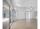 Bright living room with tile floors, large sliding doors to the pool area, and an open layout at 341 Segovia Dr, Punta Gorda, FL 33950