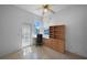 Home office featuring a built-in desk and bookshelf with exterior access at 341 Segovia Dr, Punta Gorda, FL 33950