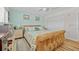 Bedroom featuring a bed with tufted headboard, with view to the closet at 4114 Yucatan Cir, Port Charlotte, FL 33948