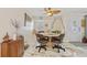 Charming dining area featuring comfortable seating and an elegant ceiling fan at 4114 Yucatan Cir, Port Charlotte, FL 33948