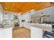 Bright kitchen featuring modern stainless steel appliances and ample countertop space at 4114 Yucatan Cir, Port Charlotte, FL 33948