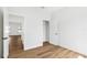 This bedroom features wood-look flooring and a closet for optimal storage at 5110 Burri Ct, North Port, FL 34288